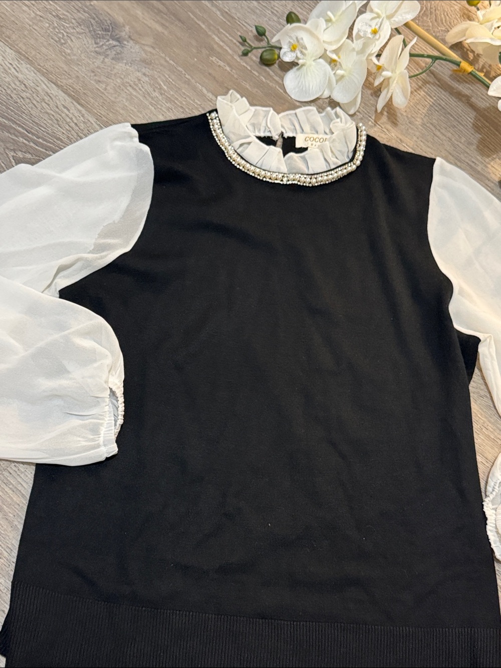 Coco blue  Black Knit Sweater with White Sheer Puff Sleeves & Pearl Collar